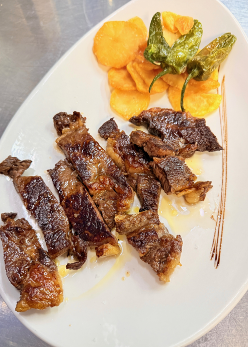 Restaurante Maluquer Quattro carne a la plancha con patatas en Valencia