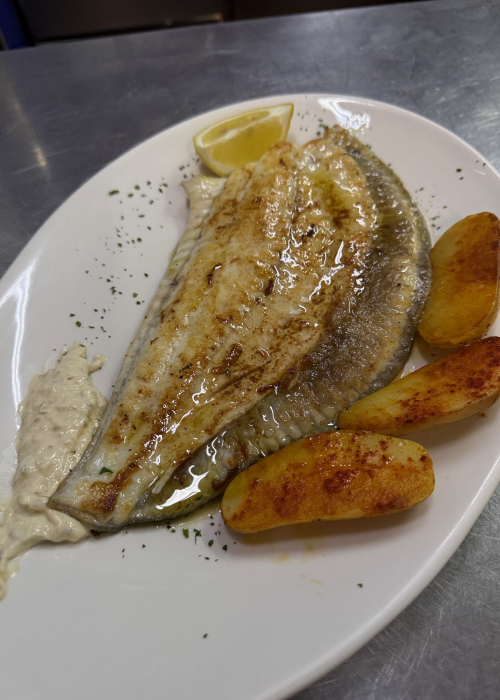 Restaurante Maluquer Quattro rodaballo a la plancha con patatas en Valencia